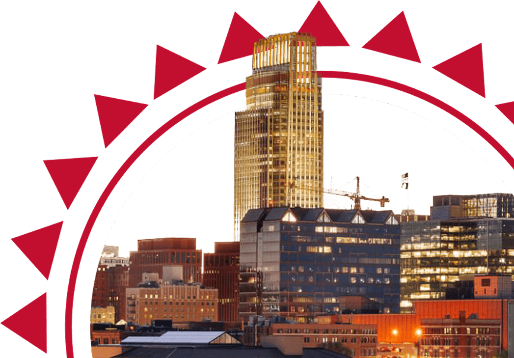 A city skyline in a red sun outline